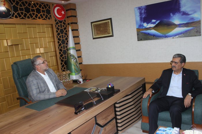 Konuk, Başkan Mehmet Tartan'ı ziyaret etti